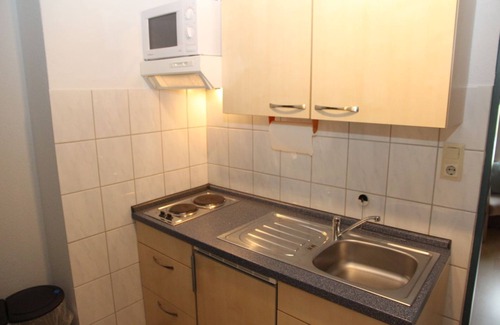 Uttum Apartment | Uttumer Mühle: Casjen - Schöne Ferienwohnung für Eine Person im Müllerhaus Uttum