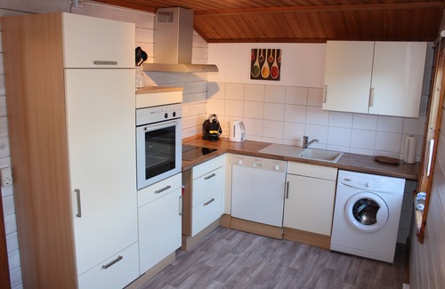 Neufeld House | Vacation at the North Sea, vacation home in Nordholz OT Spieka-Neufeld incl. beach chair