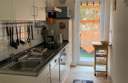 Luessow Apartment | Vacation apartment 1B first floor with fireplace - Ferienwohnungen Runschke