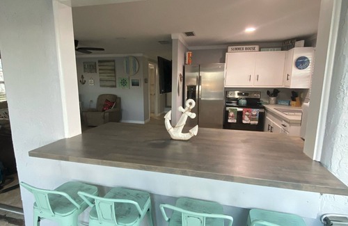 Weirsdale Cottage | View of Lake Weir & private beach access