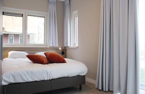 Idskenhuizen House | Villa in Friesland with Waterfront Garden