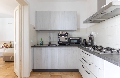 Santa Maria del Focallo Villa | Villa 'Maria Con Piscina Riscaldata' with Sea View, Wi-Fi and Air Conditioning