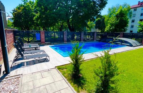 Ljubljana Apartment | Villa Moste Apartments - Modern comfort with Pool, EV station & free parking in Ljubljana