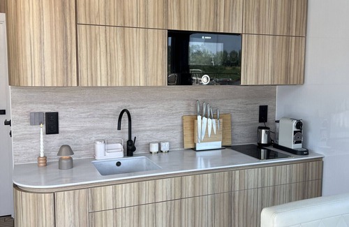 Municipality of De Ronde Venen Boat Rental | Villa Perla Mare - Sauna Experience - On a lake near Amsterdam