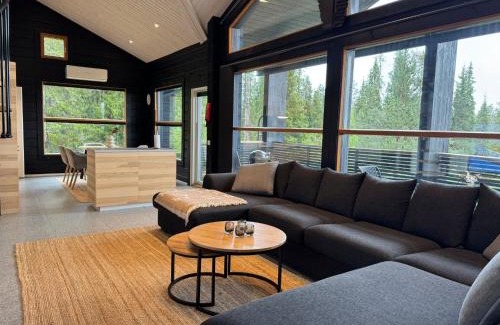 Rukatunturi Apartment | Villa Ruka - Rising Sun with 3 bedrooms, loft, sauna and balcony with a view