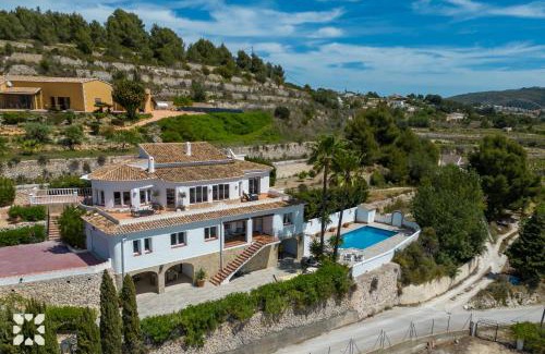 Teulada Villa | Villa Vermell by Abahana Villas