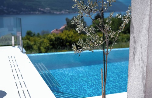 Dobrota Villa | Villa with infinity pool and views of the sea and the Bay of Kotor