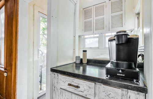 Manhattan House | Walk To Aggieville from Brick Cottage with Man Cave, Shuffle Board, Back Yard
