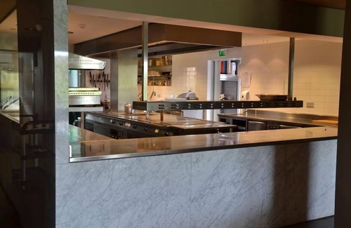 Monster Hotel | Walk to the Beach from This Tropical Getaway — Free Parking Included