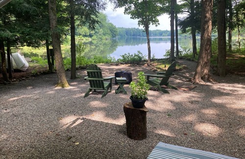 Bliss RV Rental | Waterfront camper in Adirondack-like setting