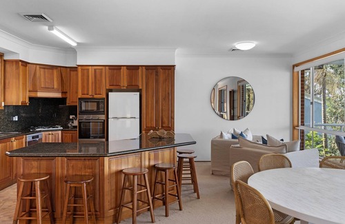 Sunshine House | Waterfront Vista Escape with Games Room Jetty Access & Expansive Views