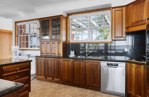 Sunshine House | Waterfront Vista Escape with Games Room Jetty Access & Expansive Views