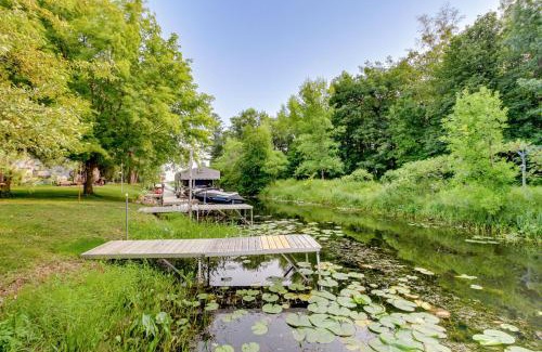 Isle House | Waterfront Wahkon Home with Wraparound Deck and Docks