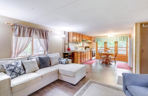 Isle House | Waterfront Wahkon Home with Wraparound Deck and Docks