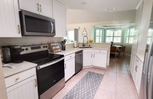 Indian Trails House | Waterfront with Dock on Private Half-acre with Hot tub and Pool