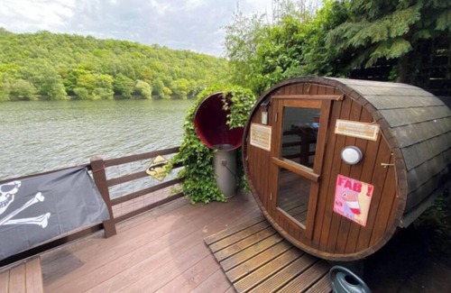 Horton Cabin | Waters edge boathouse Rudyard lake short breaks kayaks fishing hottub n
