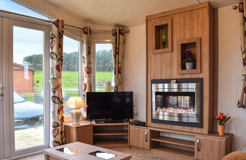 Cockermouth Cottage | Welcome to Ashness, a delightful two-bedroom caravan in scenic Moota.
