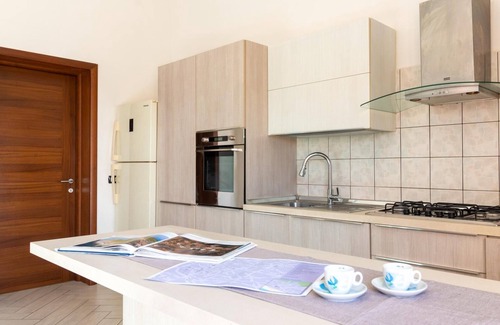 Nurachi Apartment | Welcomely - Mameli Apartment