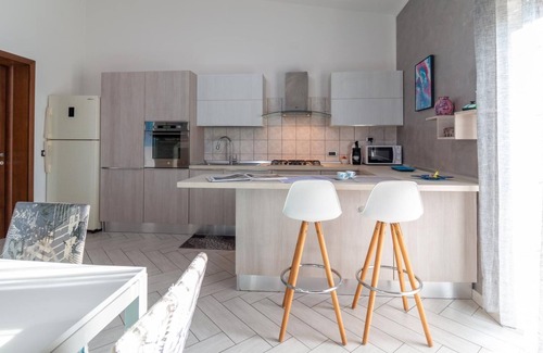 Nurachi Apartment | Welcomely - Mameli Apartment