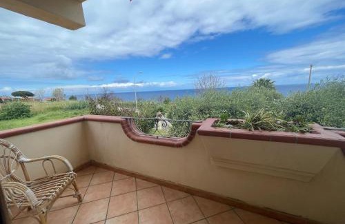 Parghelia Apartment | Welcoming house in Vibo Valentia with shared pool