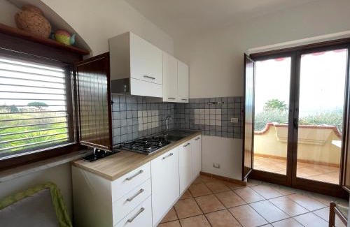 Parghelia Apartment | Welcoming house in Vibo Valentia with shared pool