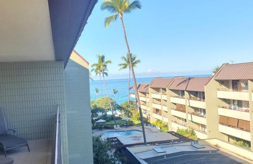 Kahaluu Bay Apartment | White Sands Beach Condo #324. BIG PATIO! Ocean and Mountains across from beach!