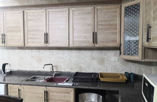 Jerash Apartment | White Tulips