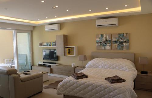 Qala Apartment | Wileg 4A Luxury Studio Apartment with Shared Swimming Pool.