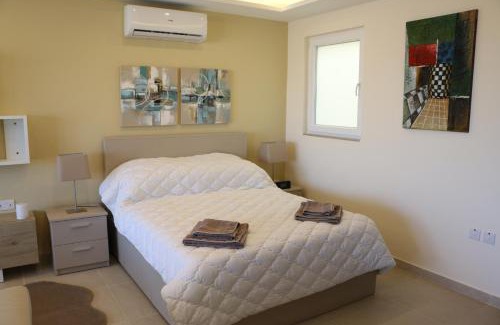 Qala Apartment | Wileg 4A Luxury Studio Apartment with Shared Swimming Pool.