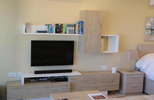 Qala Apartment | Wileg 4A Luxury Studio Apartment with Shared Swimming Pool.