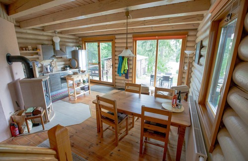 Templin House | Woodblockhouse on lakeland in between nature to relax with fireplace