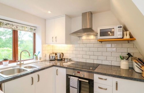 Axminster Cottage | WOODSTOCK RETREAT, pet friendly, with a garden in Chardstock, Devon