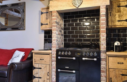 Belton Cottage | Your very own hideaway, with wood burner and a private hot tub.