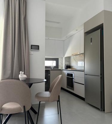 ΘΕΑ 5 Comfortable 1BR and 2BR Apartments