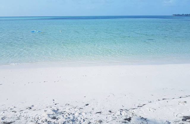 100ft from the most beautiful beach and crystal clear water, with free golf cart