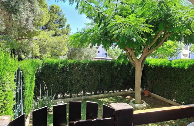 2-bedroom apartment with AC, private garden, next to calas and natural park