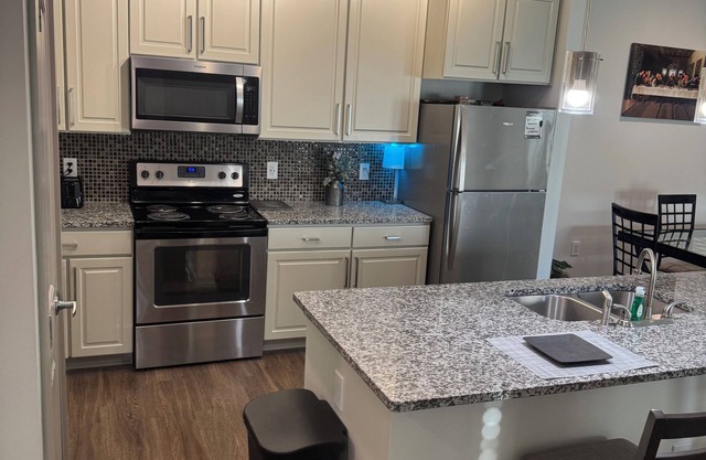 2-bedroom Apt, sits in the middle of a major shopping center and movie theater.