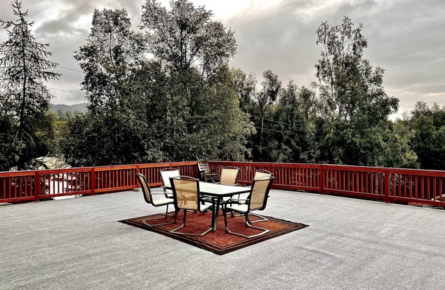2 Bedrooms, Sleeps 6-8 with private deck, gym and game room. Near the trails.