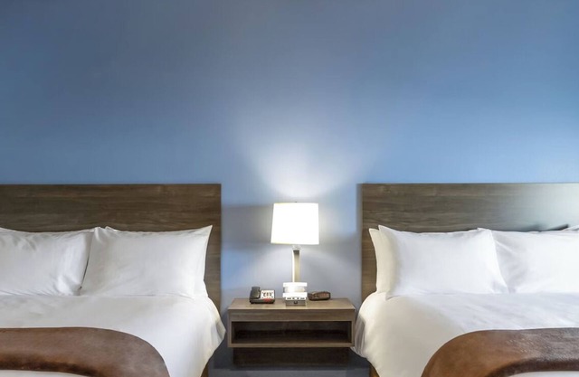 2 Convenient Rooms Near Iconic Corn Palace with Full Kitchen – Pet Friendly!