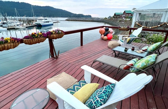 2 night minimum on Waterfront Suite with private deck at boat harbor entrance