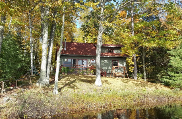 3 Bdrm, Loft, 1.5 baths knotty pine cabin, handicap accessible on 55 acre lake