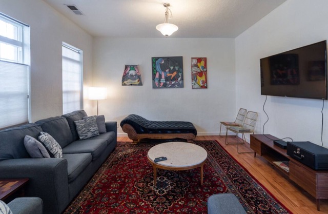 4 bd, 2 1/2 bath, on 3rd, 4 blocks from downtown, filled with art and antiques