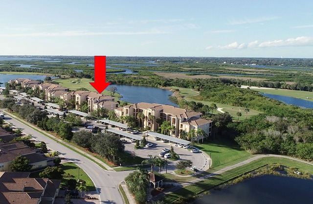 7803-205 Gorgeous lake and golf view condo