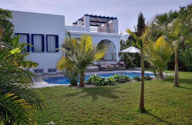 A 3 bedroom tropical villa within 1 minute walk to the beach!