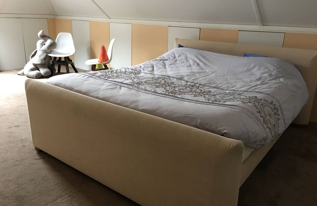 A Cozy Attic Space with Two-Person Bed in a Charming Home in Delft