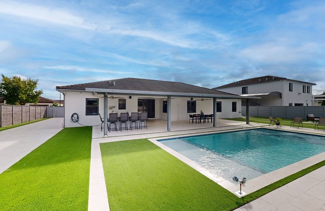 A luxurious home with private pool and outdoor kitchen