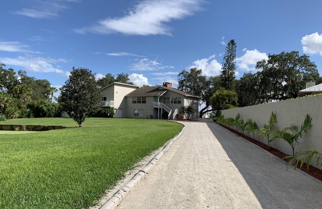 A pool home with a dock directly on the Manatee River. Breath taking sunsets!