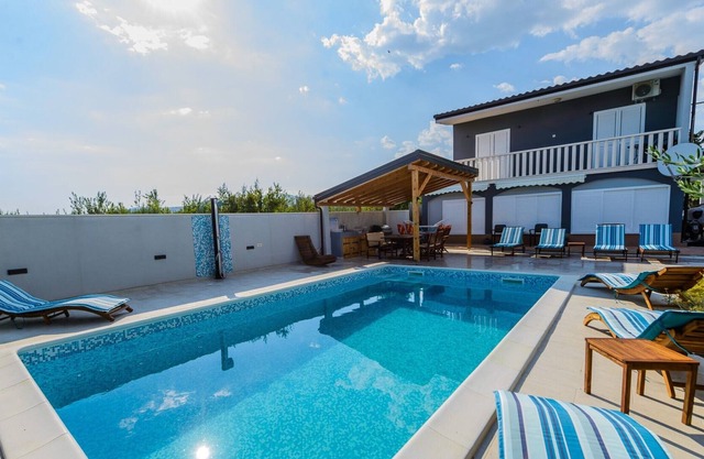 A1 apt with private beach, large pool, mooring...