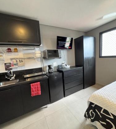 Aconchegante Studio com piscina, academia, coworking, lavanderia