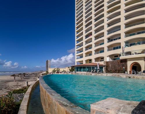 Amazing Ocean View, Heated Pools, Spas, Gym, Sauna